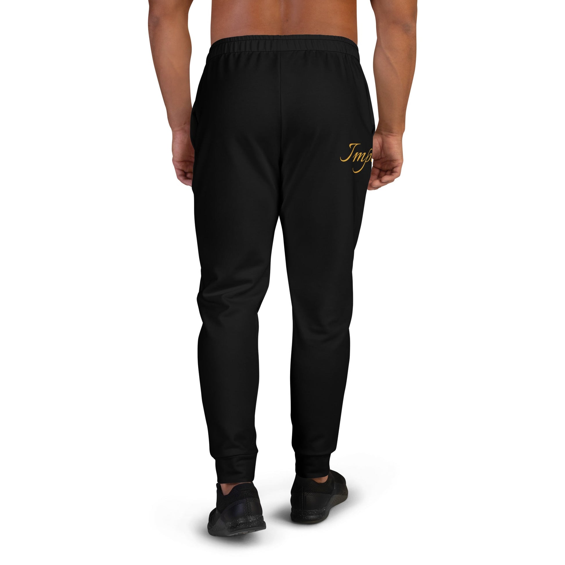 Men's black joggers by Imperial Couture by JW, featuring a slim fit, cuffed legs, and elastic waistband with drawstring.