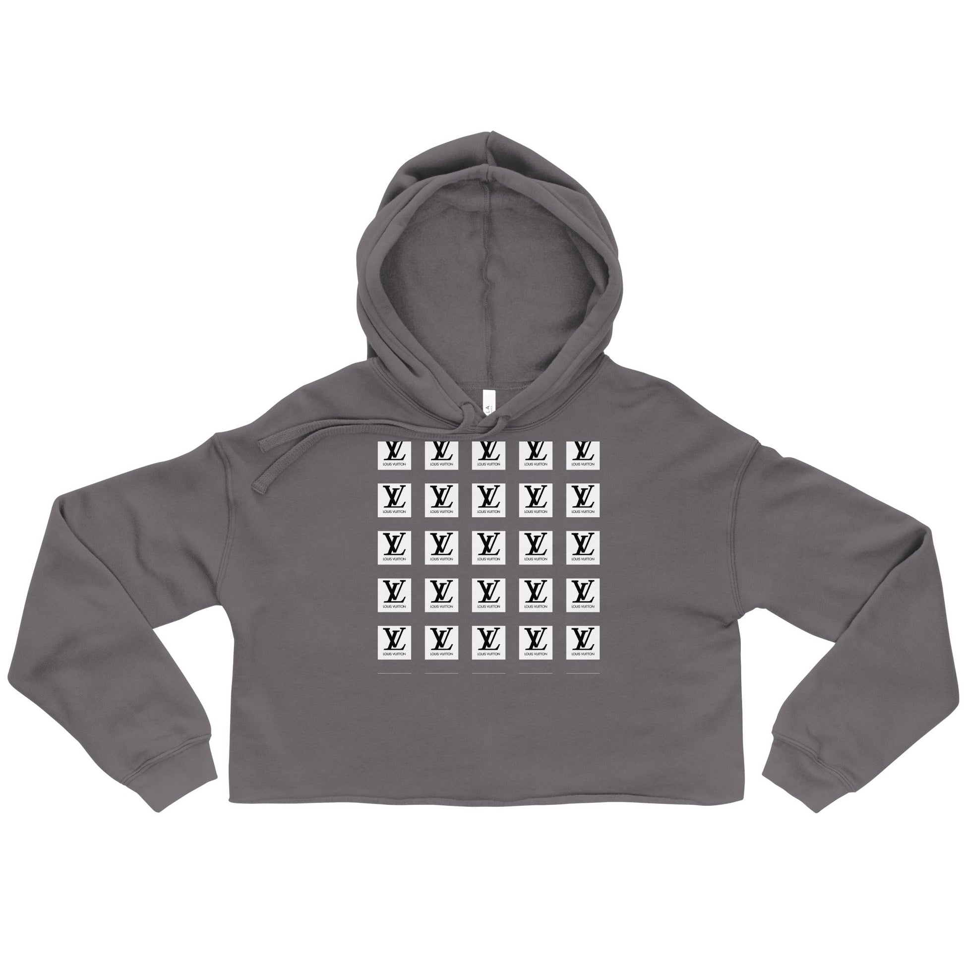 Trendy crop hoodie with raw hem and matching drawstrings.