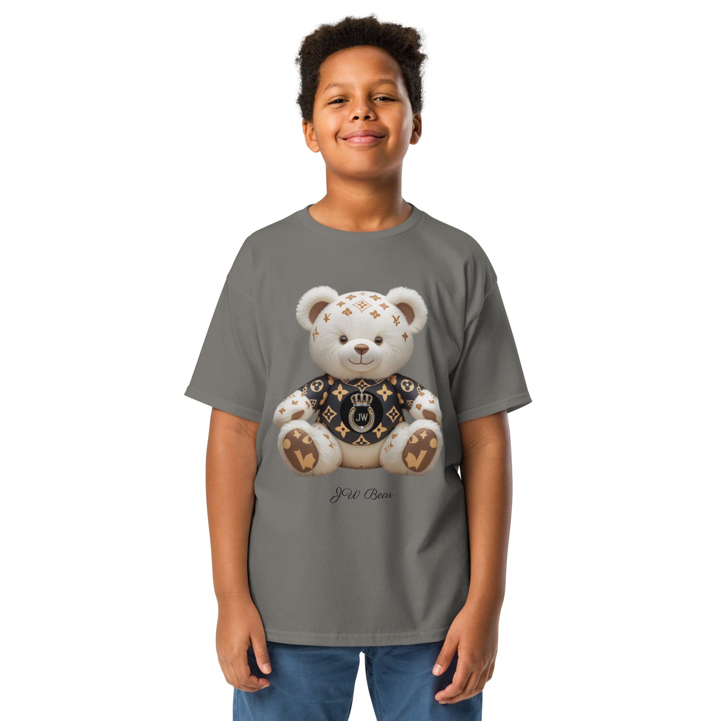JW bear Youth classic tee featuring a teddy bear design, worn by a smiling child.