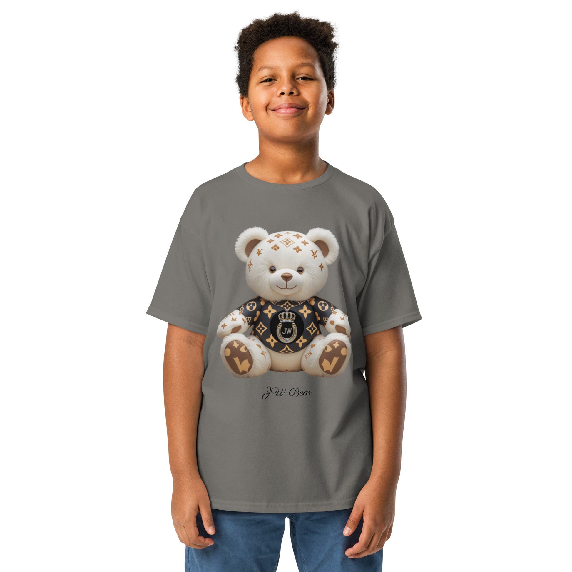 JW bear Youth classic tee featuring a teddy bear design, worn by a smiling child.